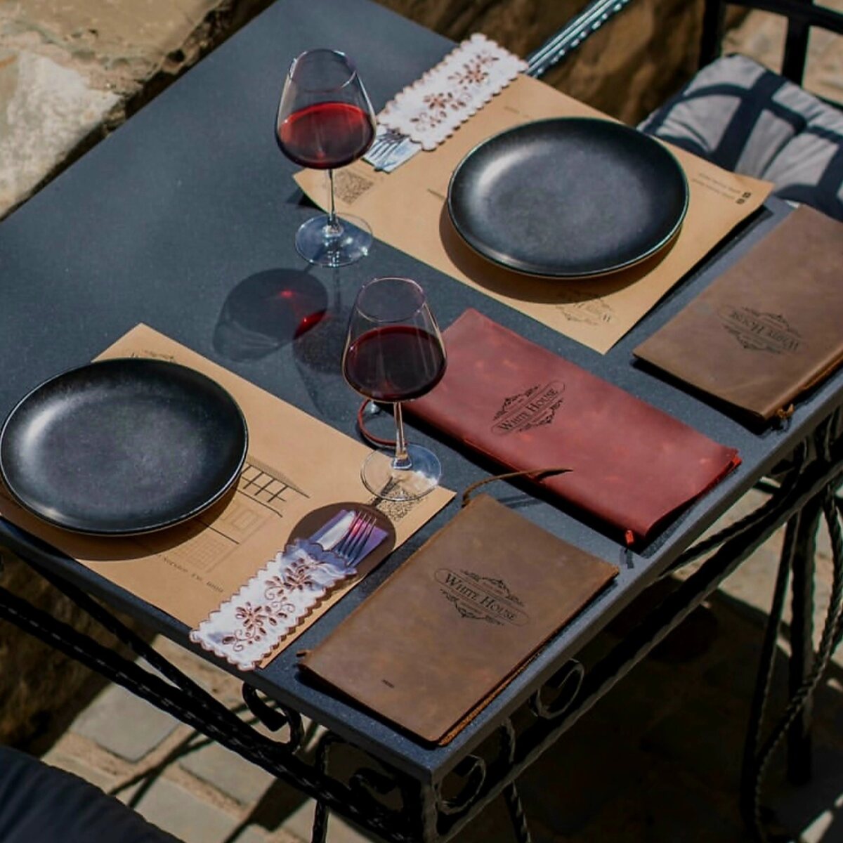 Coordinated custom menus arranged on a restaurant table